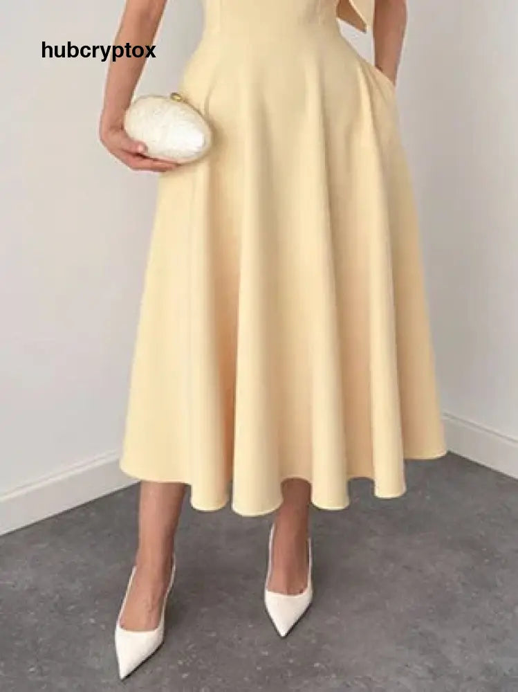 Elegant Sleeveless Bow Detail Slim-Fit Midi Dress